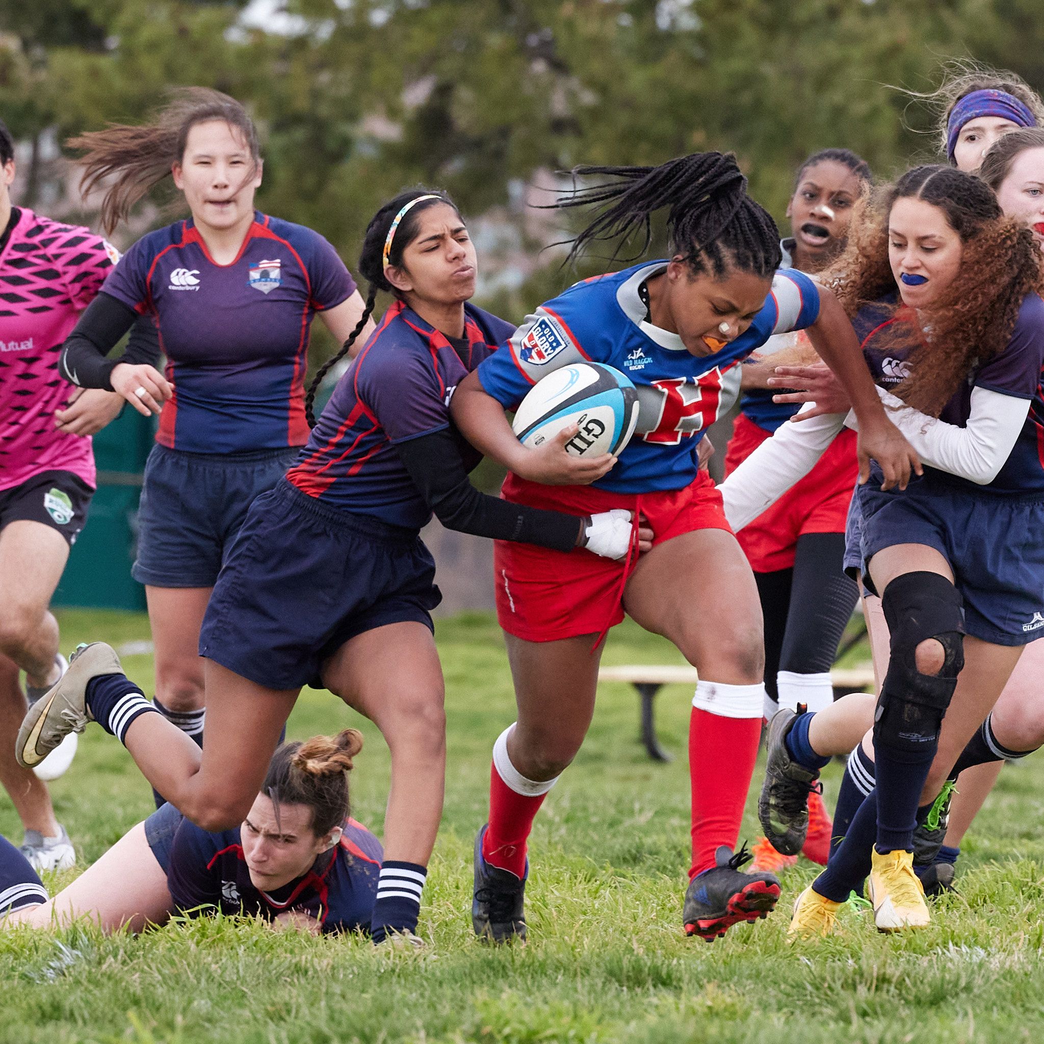 An athlete from Howard University's Women's+ Rugby club advances the ball during a match on March 26th, 2022.